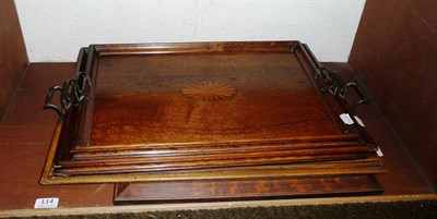 Lot 114 - Two inlaid oak trays and another and a Chatsworth cork picture (4)