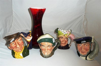 Lot 126 - A red art glass vase and four Royal Doulton character jugs