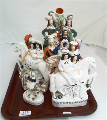 Lot 129 - Eight Staffordshire figures