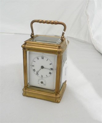 Lot 161 - A brass carriage timepiece with alarm