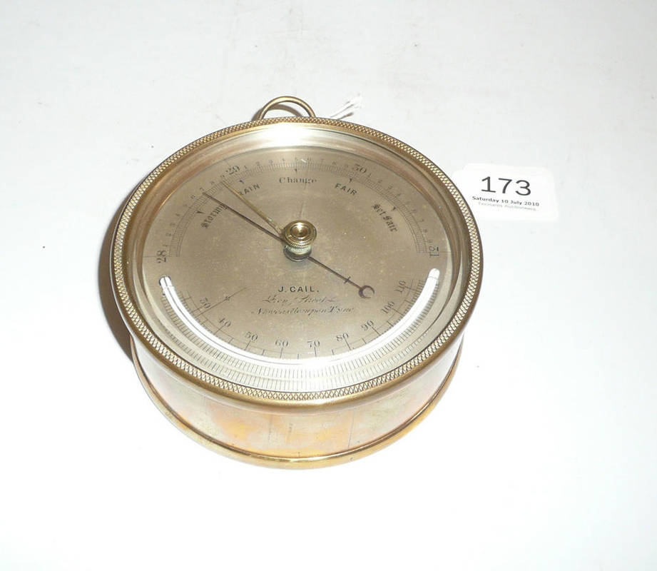 Lot 173 - A brass-cased aneroid barometer retailed by 'J Cail, Grey Street, Newcastle-Upon-Tyne'