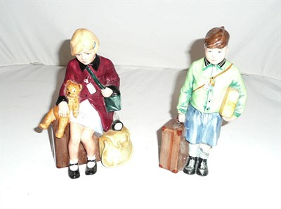 Lot 174 - Two Royal Doulton figures 'The Boy Evacuee' HN3202 and 'The Girl Evacuee' HN3203