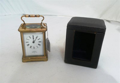 Lot 175 - A brass carriage timepiece retailed by 'C Sewell' in fitted case