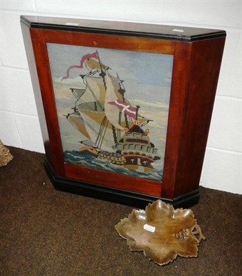 Lot 187 - Swiss musical grape leaf dish and a tapestry ship mounted in a mahogany and ebonised cover