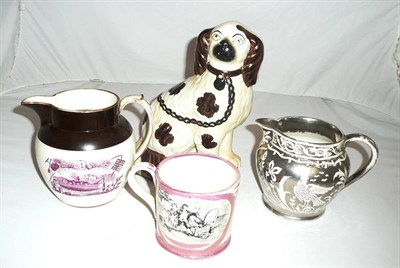 Lot 198 - A dated pearlware jug 1829, a silver resist jug, another, a Sunderland jug and a Staffordshire dog