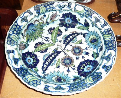 Lot 208 - A Continental blue and green floral design charger (restored)