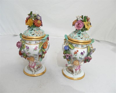 Lot 216 - A pair of Meissen encrusted vases and covers a/f