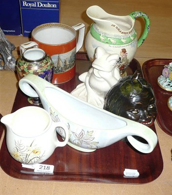 Lot 218 - A tray including Prattware loving cup, Crown Devon jug lacking musical movement, a Beswick frog and