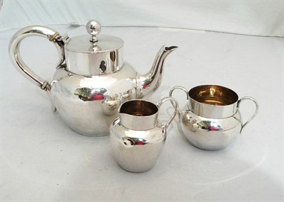 Lot 219 - A three piece silver teaset