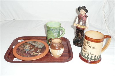 Lot 231 - A tray including Doulton Lambeth stoneware tankard relief decorated jug, hand painted plaque,...