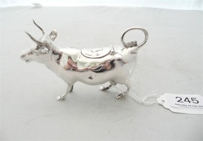 Lot 245 - A silver cow creamer