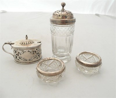 Lot 249 - Silver and cut glass caster, silver mustard and two salts