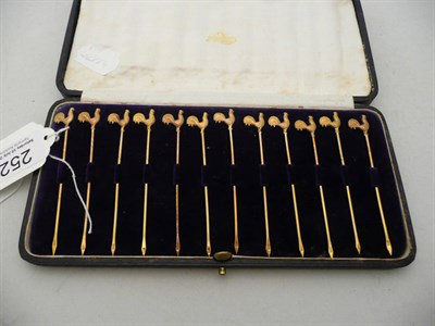 Lot 252 - Set of 9ct gold cocktail sticks