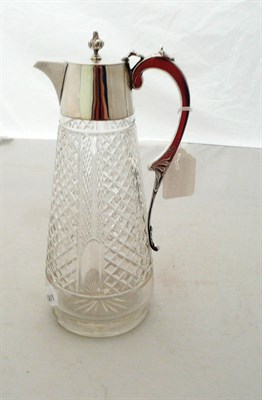 Lot 260 - A silver mounted claret jug