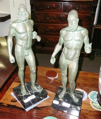 Lot 288 - A pair of bronze effect figures of nude Greek wrestlers, on marble bases