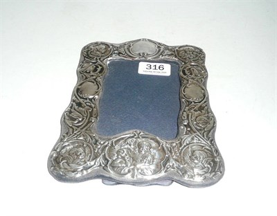 Lot 316 - A silver-mounted photograph frame