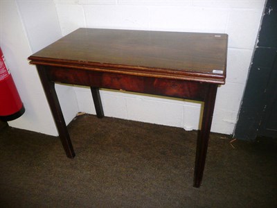 Lot 365 - A George III mahogany fold over tea table