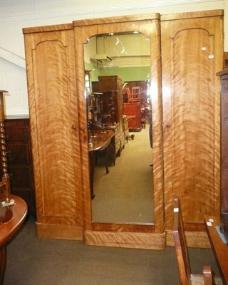 Lot 368 - A Victorian breakfront birch wardrobe