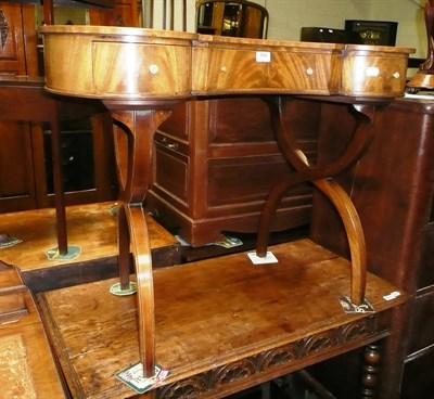 Lot 394 - A mahogany kidney shaped dressing table