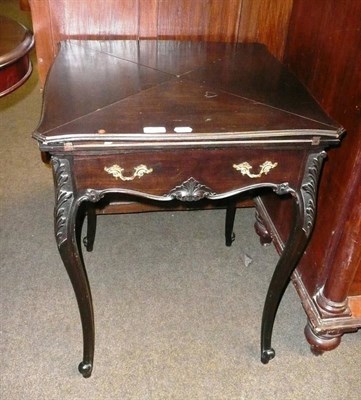 Lot 402 - Mahogany swivel envelope card table