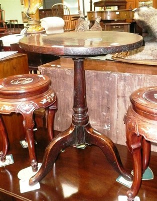 Lot 407 - A 19th century oak tripod table