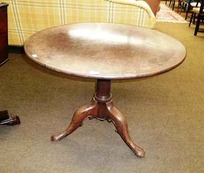 Lot 411 - A George III mahogany birdcage action tripod table