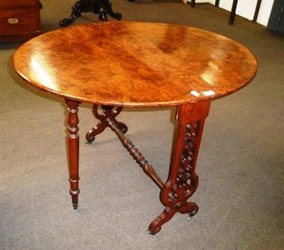 Lot 415 - A Victorian walnut Sutherland table