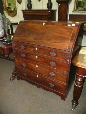 Lot 421 - A Georgian inlaid mahogany bureau