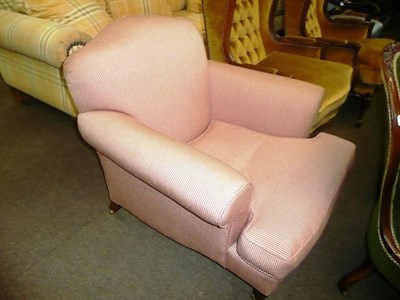 Lot 425 - A modern cream and red upholstered elbow easy chair