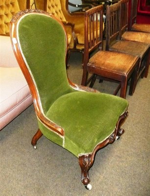 Lot 429 - A Victorian walnut-framed nursing chair