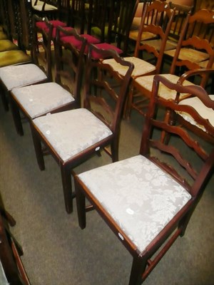 Lot 432 - A set of four mahogany ladder back dining chairs