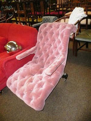 Lot 437 - A Victorian pink button-upholstered armchair