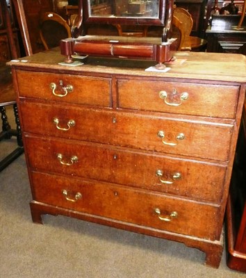 Lot 459 - A George III oak four height chest