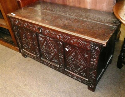 Lot 463 - A 17th century joined oak carved kist