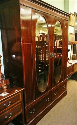 Lot 479 - An Edwardian four piece inlaid bedroom suite comprising of a wardrobe, dressing chest,...