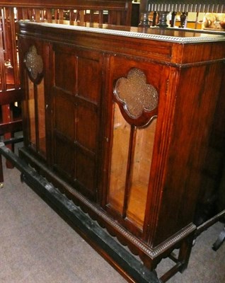 Lot 482 - A 1930's oak display cabinet