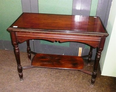 Lot 491 - An Edwardian mahogany fold over card table