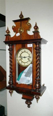 Lot 508 - A walnut cased wall clock with pendulum