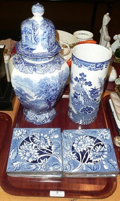 Lot 3 - Seven blue and white floral decorated pottery tiles, blue and white cylindrical vase and a vase and