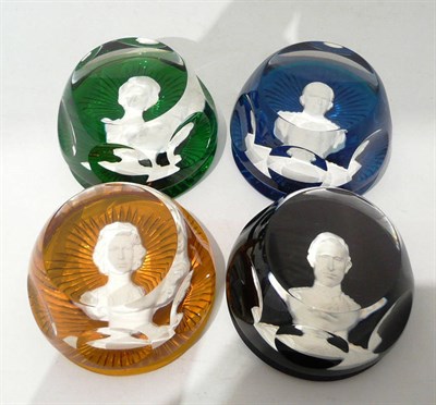 Lot 17 - Four boxed Baccarat coloured paperweights with sulphides of Princess Anne, Queen Elizabeth II,...