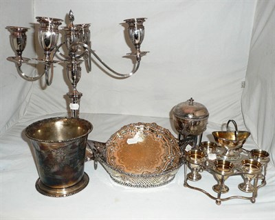 Lot 28 - Silver plate including pierced basket, egg stand, candelabra, wine cooler, etc