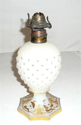 Lot 31 - A 19th century glass gilt-decorated oil lamp