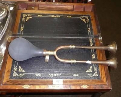 Lot 42 - Victorian walnut writing box and a brass double car horn (possibly Bentley)