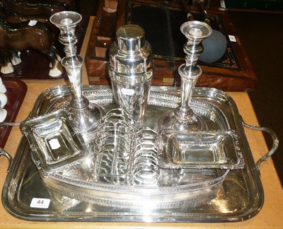 Lot 44 - Silver plate including two-handled tray, galleried tray, cocktail shaker, two toast-racks, pair...
