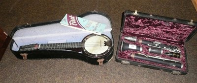 Lot 45 - Cased banjo and a cased clarinet