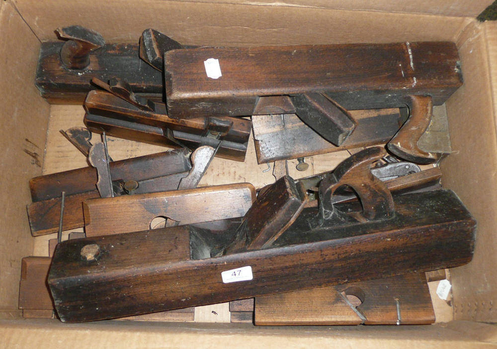 Lot 47 - A collection of beech woodworking planes, including moulding and jack planes, plus three metal...