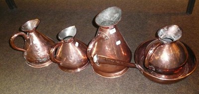Lot 48 - Large copper pan and four assorted copper measures
