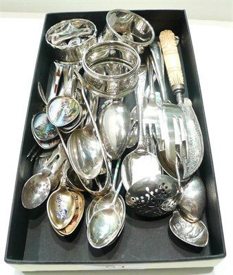 Lot 51 - Small silver including teaspoons, napkin rings, cake forks and enamelled commemorative spoons
