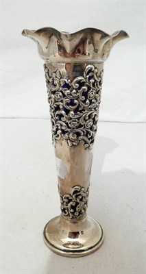 Lot 101 - Silver vase with blue glass liner