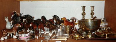 Lot 115 - Shelf including twelve pottery horses, brass candlesticks, horse brasses, silver plated items...